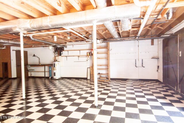 basement featuring electric water heater