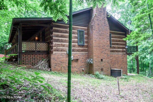 view of property exterior featuring central AC unit