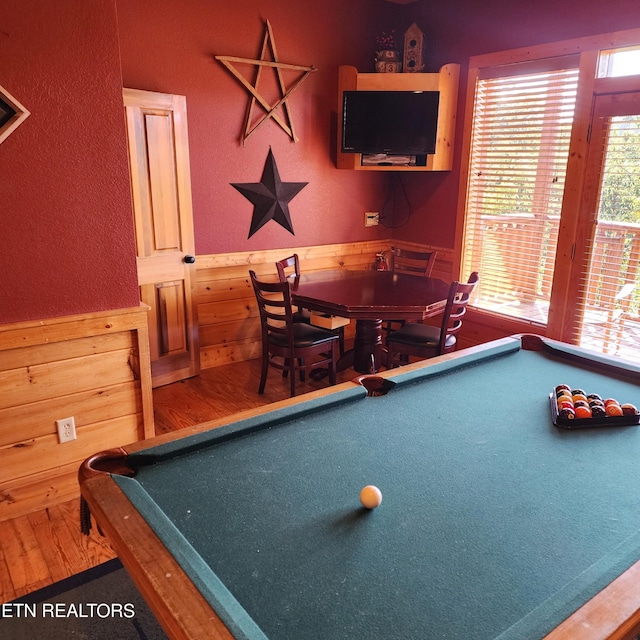 rec room featuring wooden walls and pool table