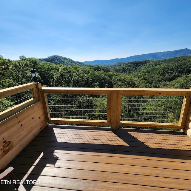 deck with a mountain view