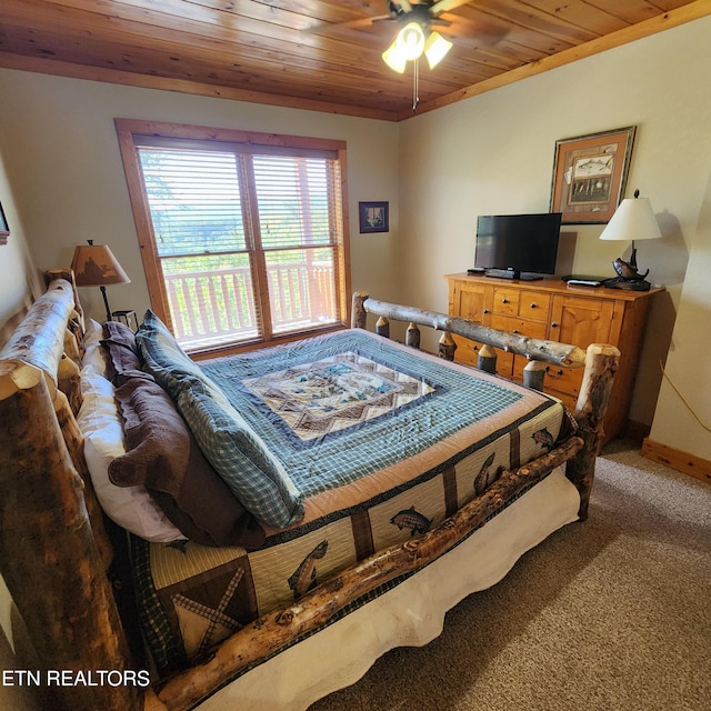 carpeted bedroom with ceiling fan and wooden ceiling