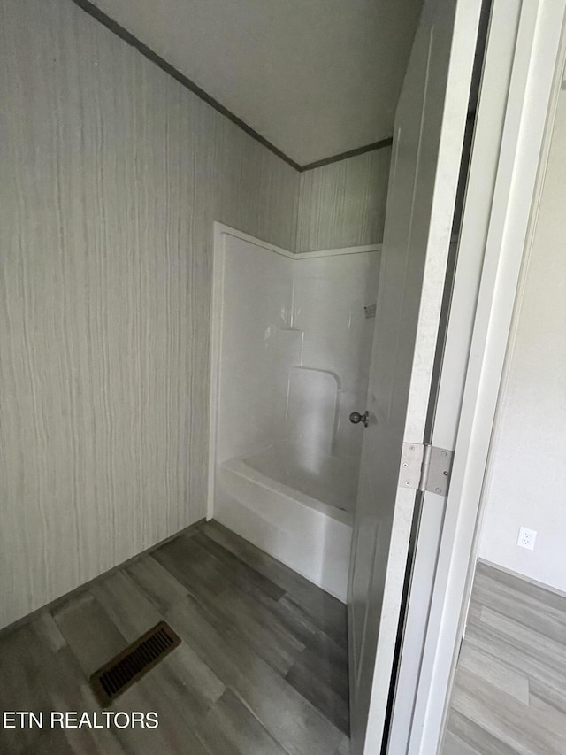 bathroom featuring wood-type flooring