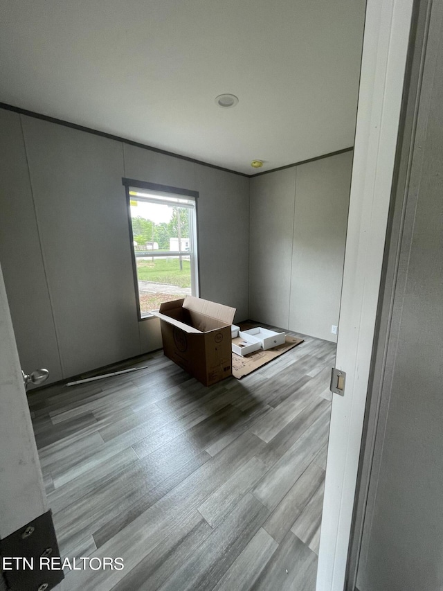 bedroom featuring light hardwood / wood-style flooring and a closet