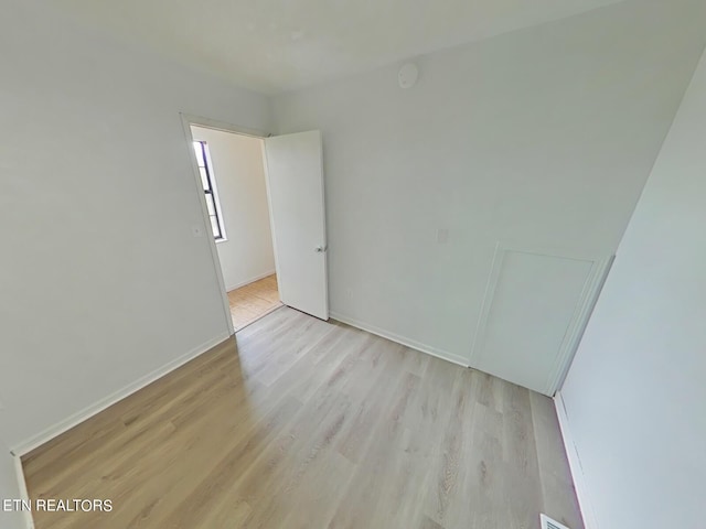 empty room featuring light hardwood / wood-style flooring