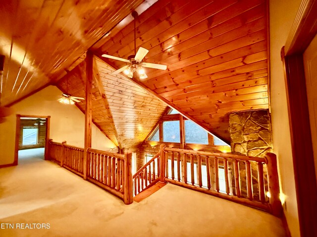 bonus room with ceiling fan, carpet floors, wood ceiling, and vaulted ceiling