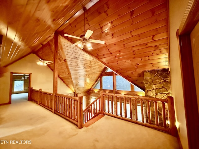 additional living space featuring lofted ceiling, wooden ceiling, carpet floors, and ceiling fan