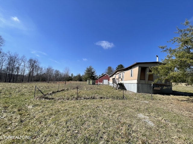 view of yard featuring a rural view