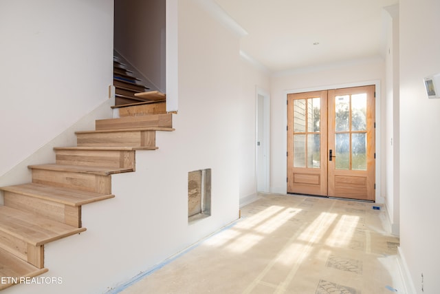 entryway featuring french doors