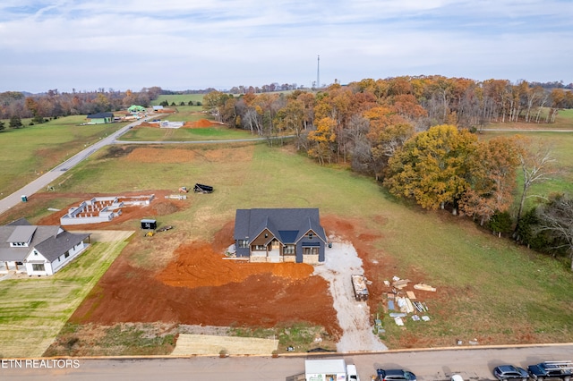 birds eye view of property featuring a rural view