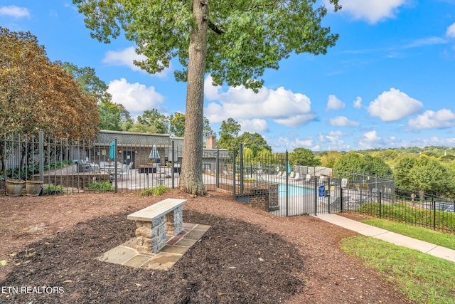 view of property's community featuring a pool