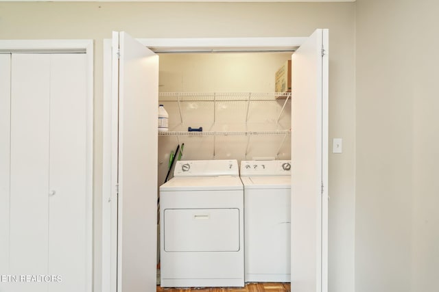 laundry room featuring washer and clothes dryer