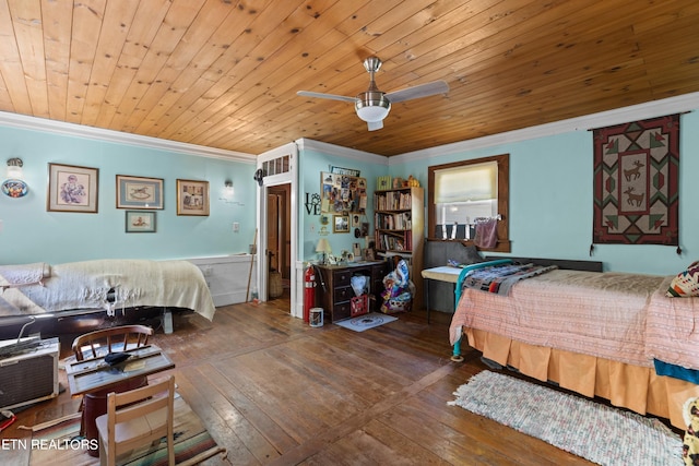 bedroom with hardwood / wood-style floors, ornamental molding, and wood ceiling