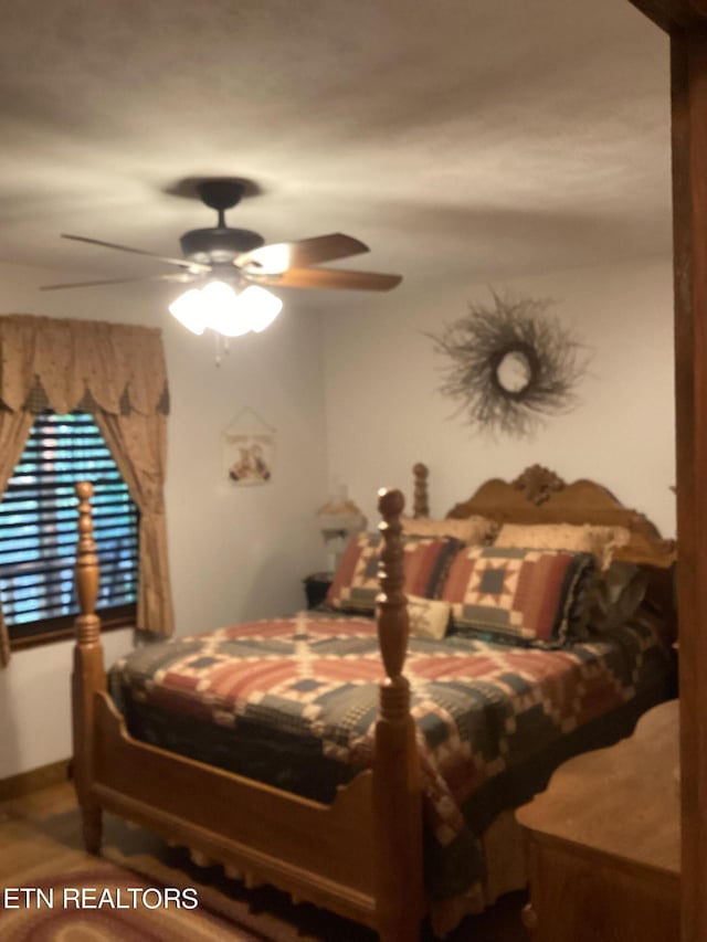 bedroom featuring a ceiling fan