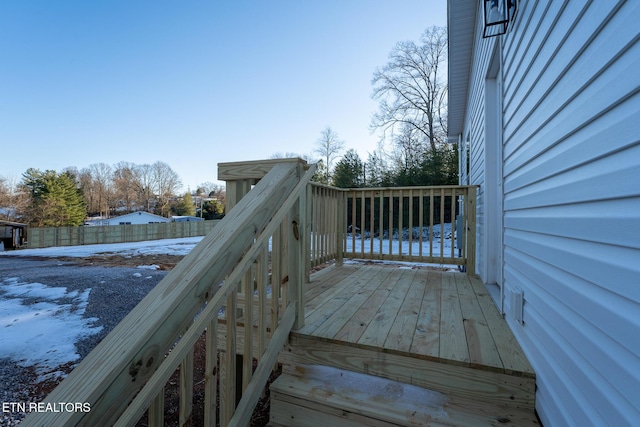 view of snow covered deck