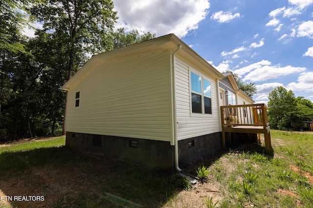 105 Highland Ave, Clinton, TN 37716 - view of home's exterior featuring crawl space and a wooden deck