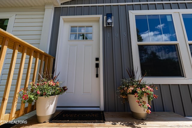 105 Highland Ave, Clinton, TN 37716 - view of exterior entry with board and batten siding