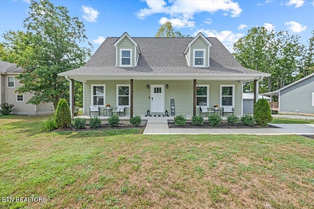 view of front facade featuring a front lawn and covered porch