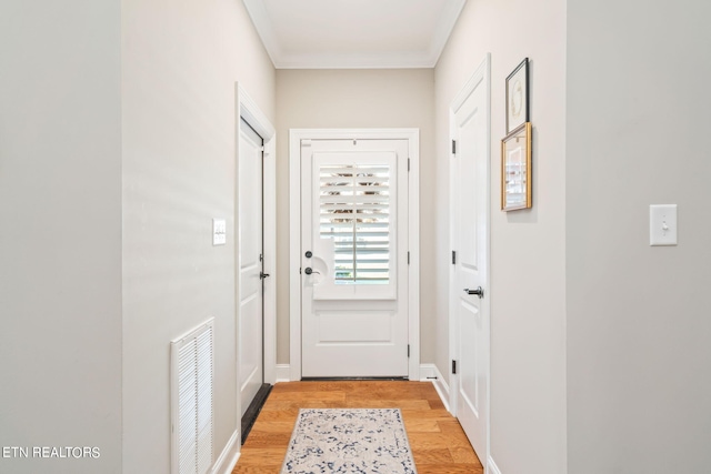 entryway with light hardwood / wood-style flooring