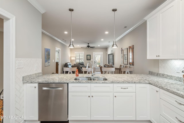 kitchen with sink, white cabinets, kitchen peninsula, ceiling fan, and stainless steel dishwasher