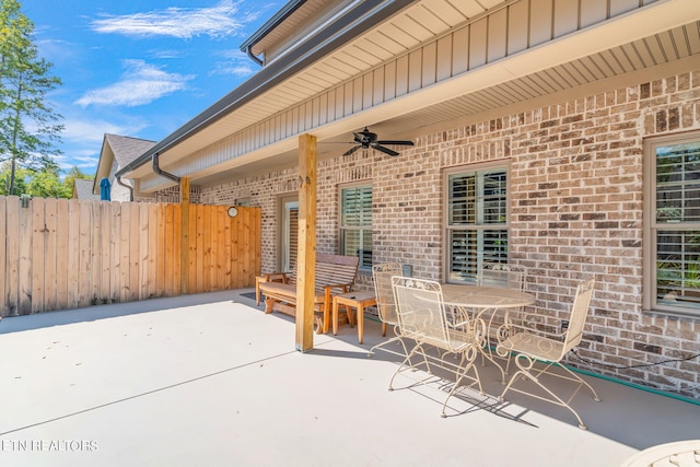 view of patio featuring ceiling fan