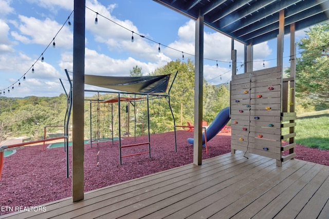 view of jungle gym featuring a deck