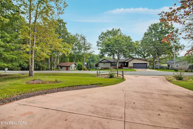 exterior space featuring a front yard and a garage