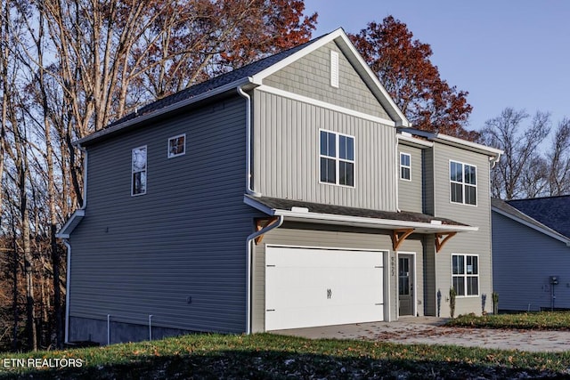 view of front of property featuring a garage