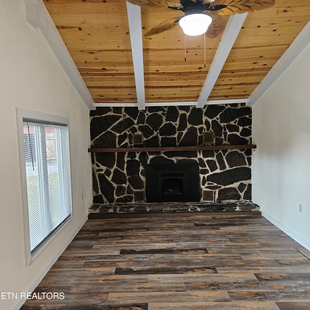 unfurnished living room with ceiling fan, a fireplace, wood ceiling, and wood-type flooring