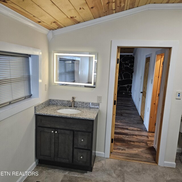 bathroom with vanity, wooden ceiling, lofted ceiling, hardwood / wood-style flooring, and ornamental molding