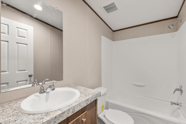 full bathroom with ornamental molding,  shower combination, vanity, and toilet