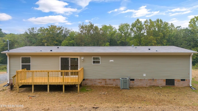 back of house with a wooden deck and central air condition unit