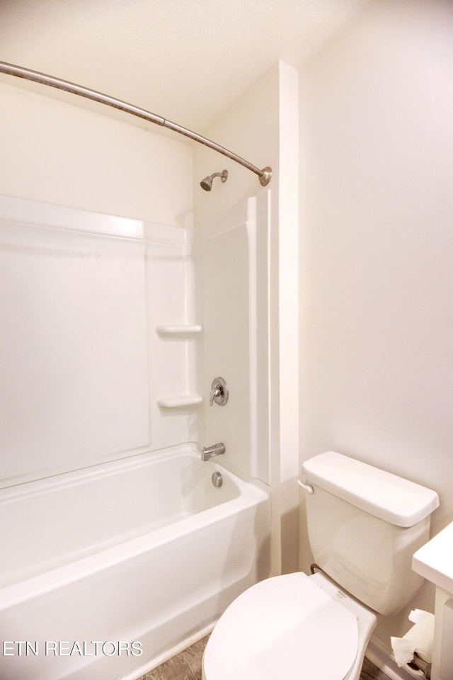 full bathroom with vanity, bathtub / shower combination, and toilet