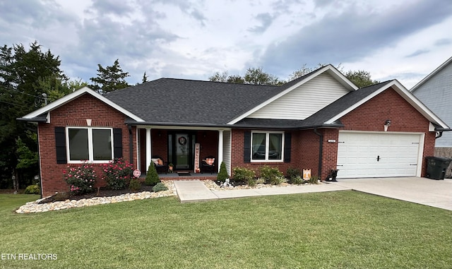 ranch-style home with a garage and a front yard