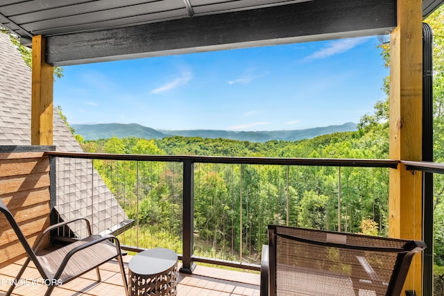 balcony featuring a mountain view