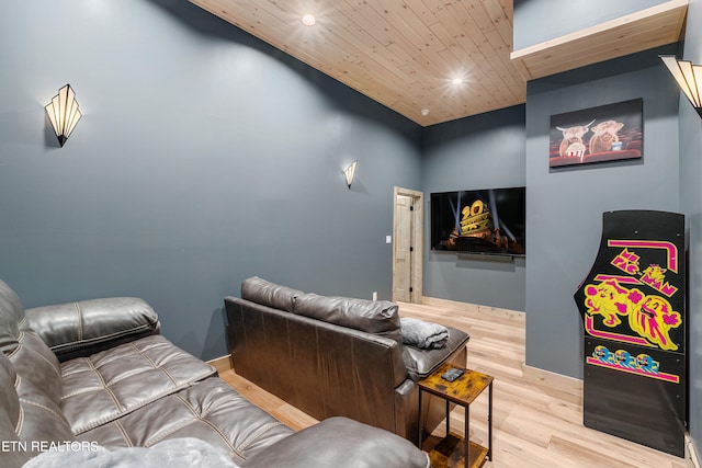 interior space featuring light wood-type flooring, wood ceiling, and vaulted ceiling