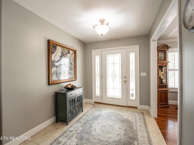 foyer with light hardwood / wood-style floors