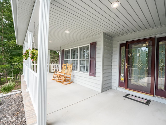 entrance to property with a porch