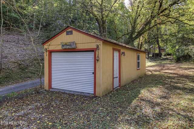 garage with wood walls