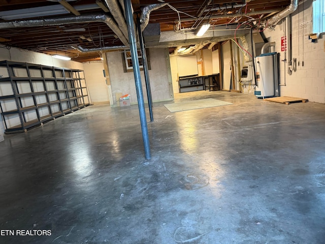 basement featuring water heater