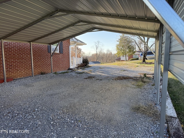 view of parking with a carport