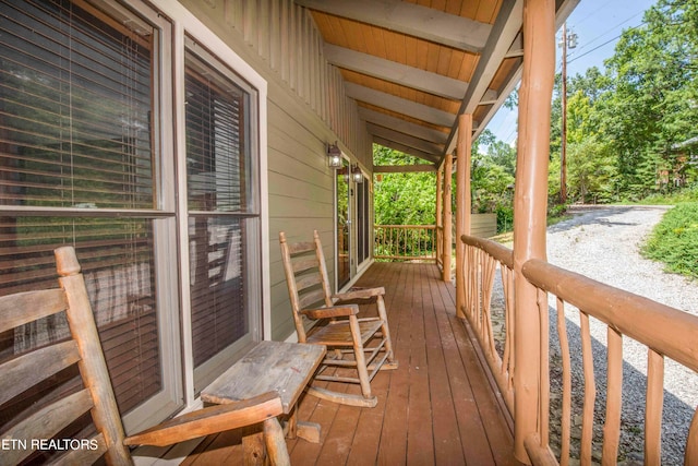 wooden deck featuring a porch