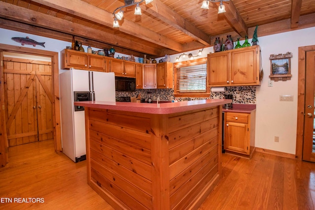 kitchen with white fridge with ice dispenser, beamed ceiling, light wood-type flooring, and wooden ceiling