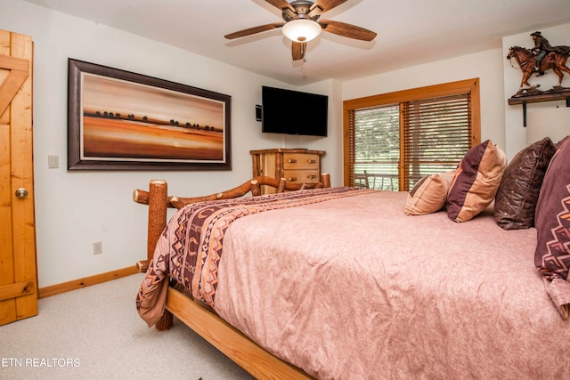 bedroom featuring ceiling fan and carpet flooring