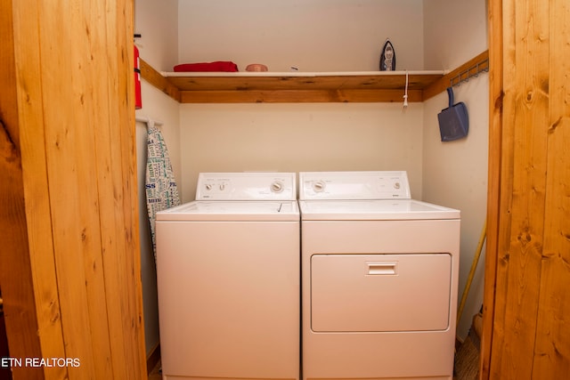 laundry area with independent washer and dryer