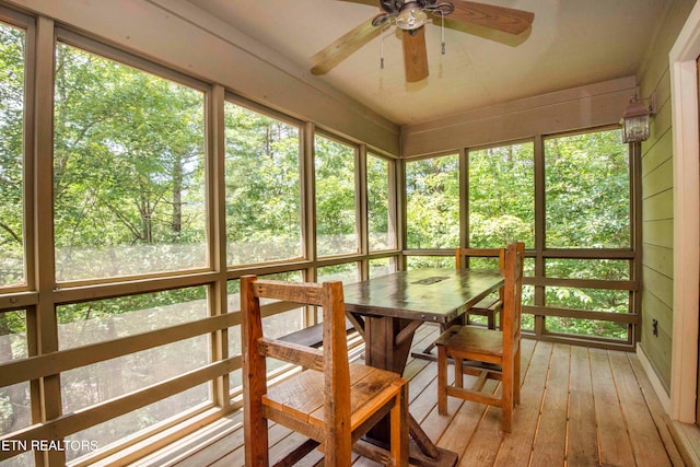 sunroom / solarium with ceiling fan