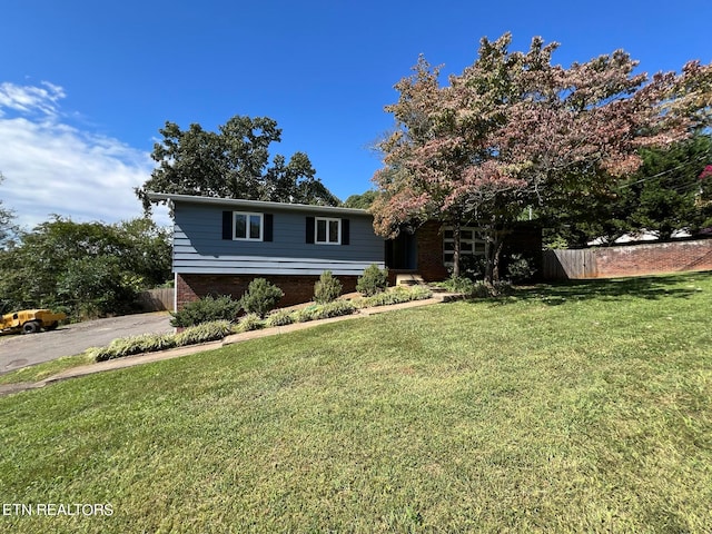 view of front of home with a front yard