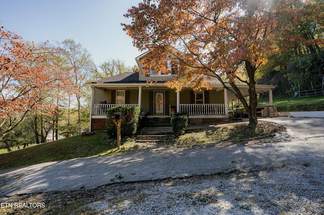 view of front of home featuring covered porch