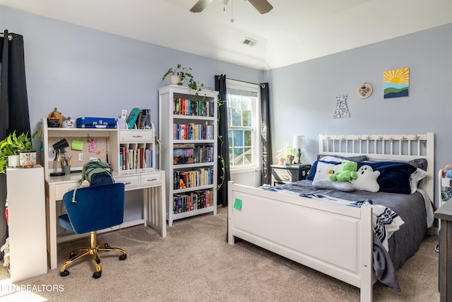 carpeted bedroom with ceiling fan