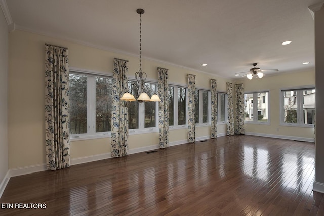 unfurnished dining area with ornamental molding, dark wood-style flooring, and visible vents