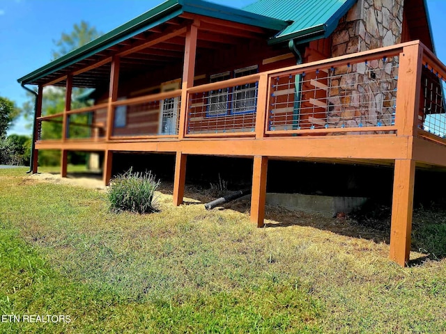 view of home's exterior featuring a yard